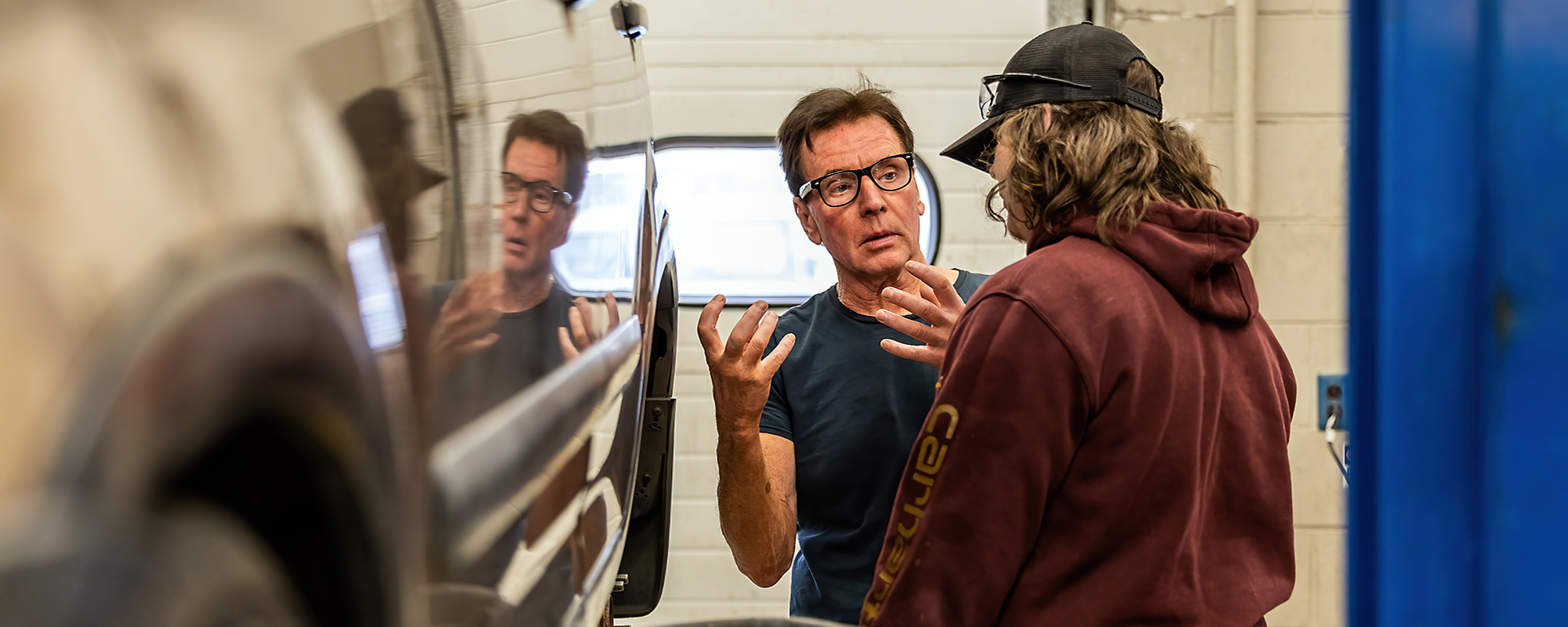 Automotive Mechanics Teacher and Student